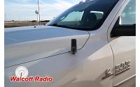 low-profile gmrs antenna mounted to the fender of a dodge ram pickup