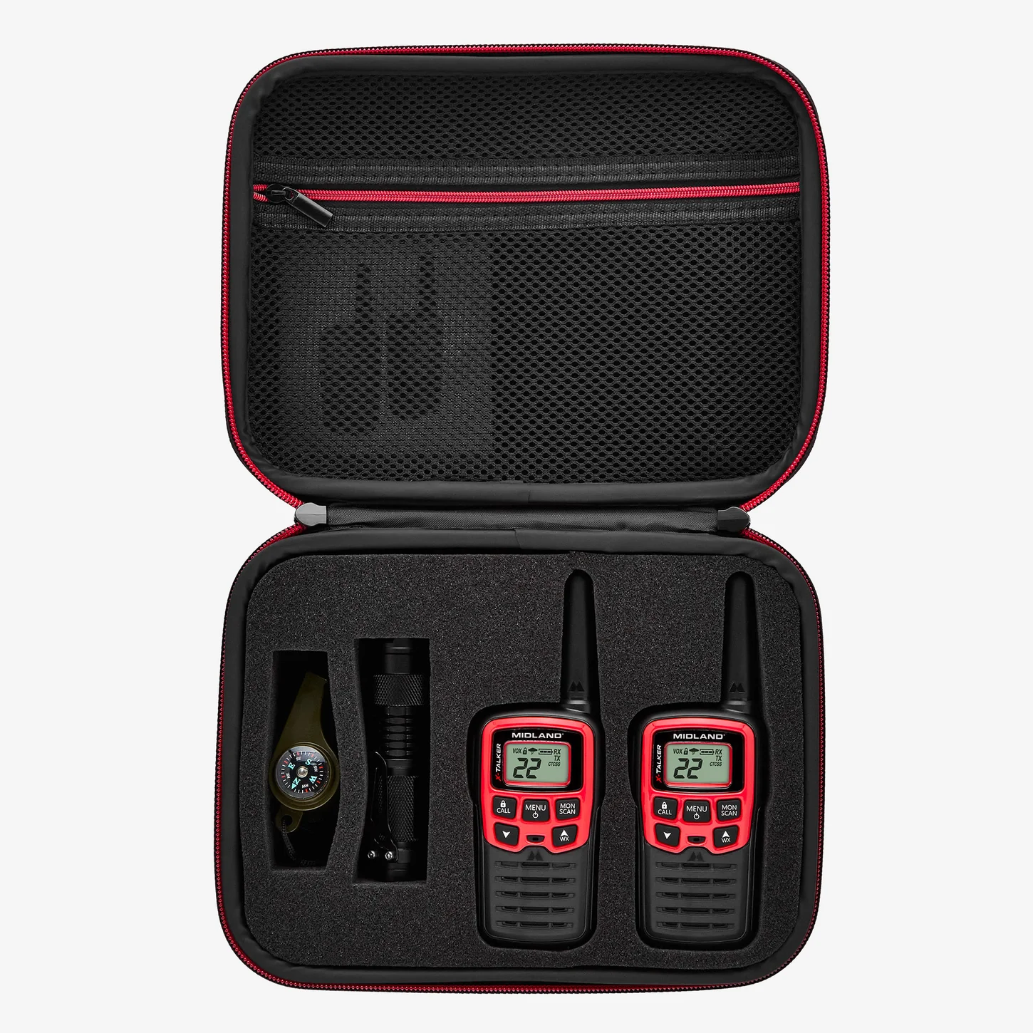 An open view of the carrying case for the ex37VP with two radios, LED flashlight, compass, whistle, and rechargeable batteries.