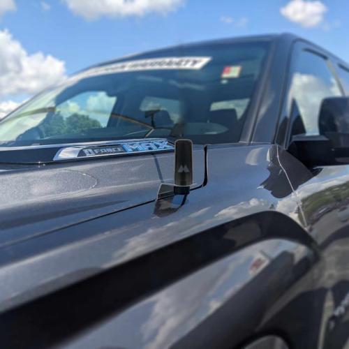 gmrs antenna mounted to the fender of a toyota tundra