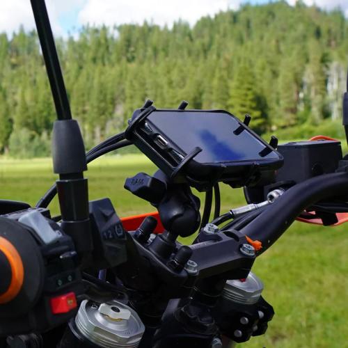 cell phone attached to a motorcycle using a spring loaded RAM mount