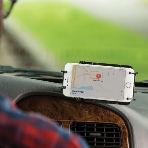 an iphone mounted in a RAM phone holder inside of a vehicle